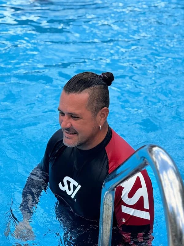 Instructor running a session in the pool