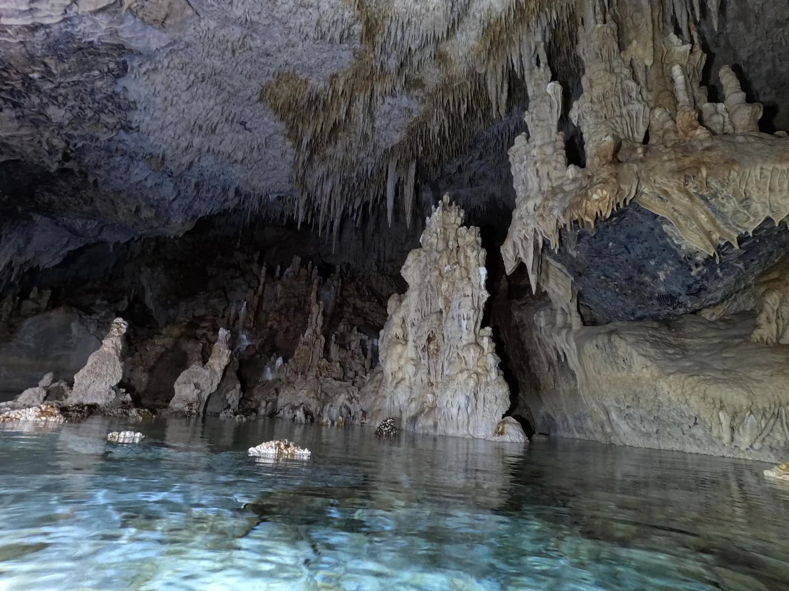 Stalactites mirrored in still water